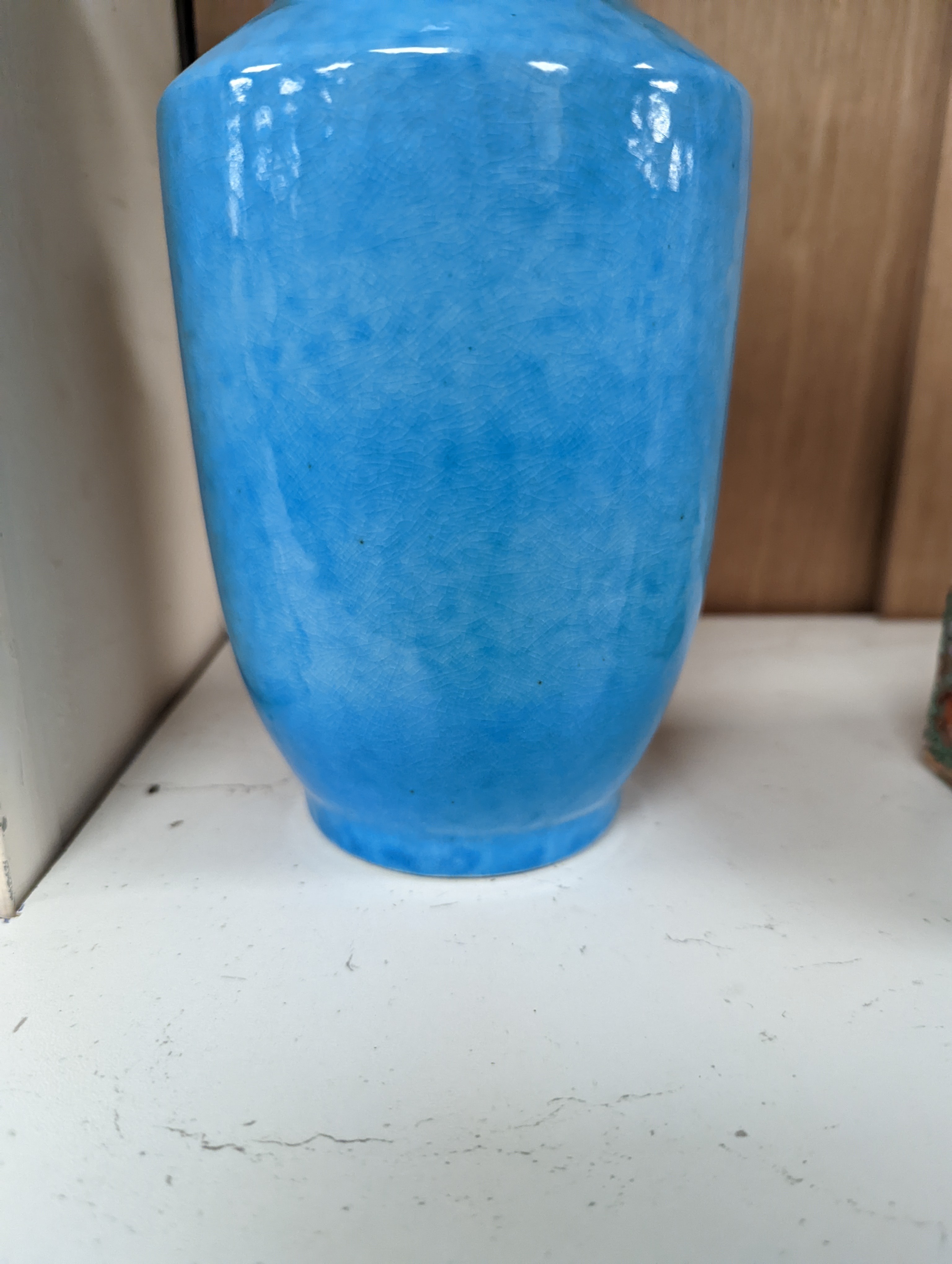 A Chinese turquoise glazed vase 22cm, with a fine crackle to the exterior glaze